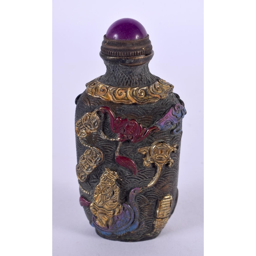 2261 - A 19TH CENTURY CHINESE BRONZE SNUFF BOTTLE decorated with figures and landscapes. 8 cm x 4 cm.