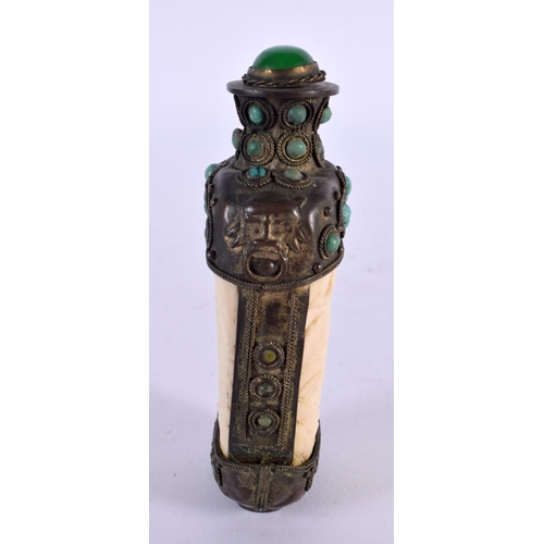 2263 - A 19TH CENTURY CHINESE TIBETAN WHITE METAL AND BONE SNUFF BOTTLE carved with figures. 9.5 cm x 5 cm.