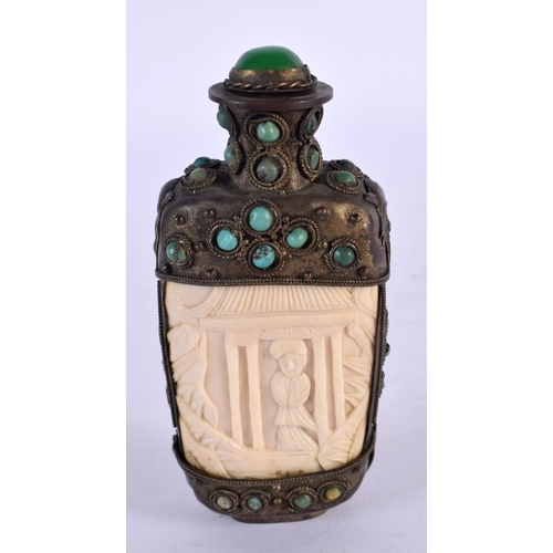 2263 - A 19TH CENTURY CHINESE TIBETAN WHITE METAL AND BONE SNUFF BOTTLE carved with figures. 9.5 cm x 5 cm.