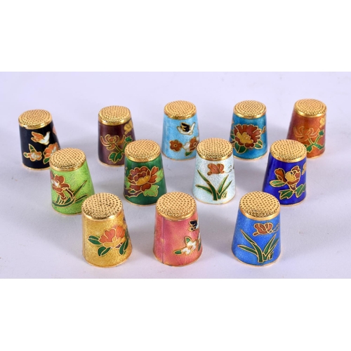 2286 - TWELVE CHINESE CLOISONNE ENAMEL THIMBLES 20th Century. 3 cm x 2 cm. (12)