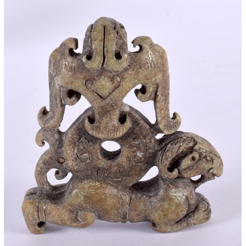 2301 - A CHINESE CARVED ARCHAIC JADE FIGURE 20th Century. 8 cm x 6 cm.