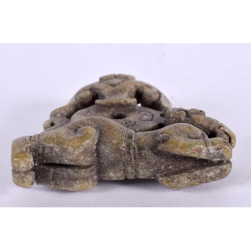 2301 - A CHINESE CARVED ARCHAIC JADE FIGURE 20th Century. 8 cm x 6 cm.