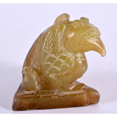 2309 - A CHINESE CARVED JADE FIGURE OF A BIRD 20th Century. 5 cm x 3 cm.