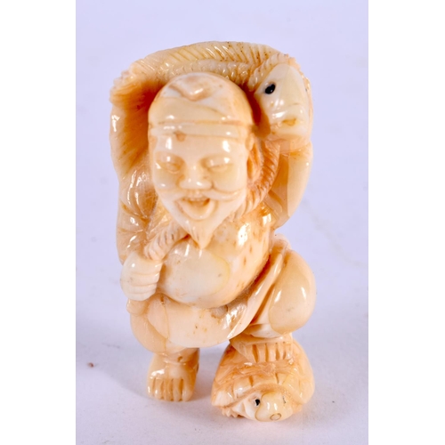 2319 - A JAPANESE CARVED BONE FISHERMAN OKIMONO. 5 cm x 3 cm.