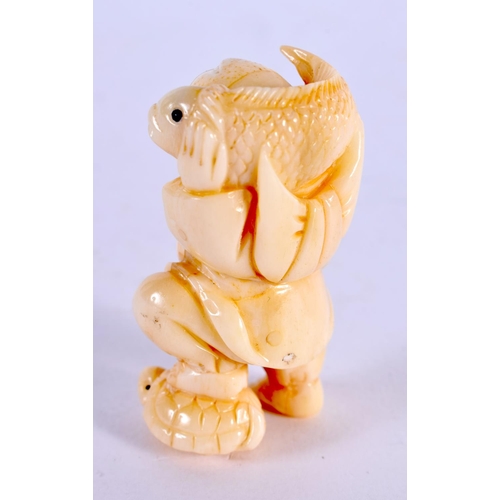 2319 - A JAPANESE CARVED BONE FISHERMAN OKIMONO. 5 cm x 3 cm.