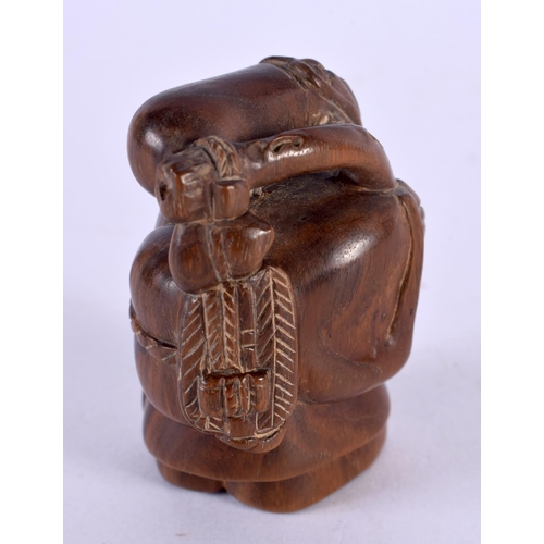 2324 - A JAPANESE CARVED BOXWOOD SAGE NETSUKE. 6 cm x 3 cm.