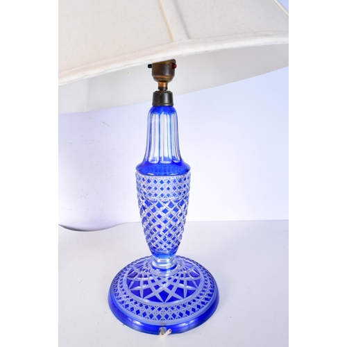 3469 - A Bohemian glass lampstand  together with a marble based lampshade. 60 cm (2).