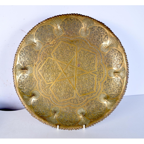 3470 - An Islamic heavily embossed tray together with an Australian wooden bowl. 36 cm (2),