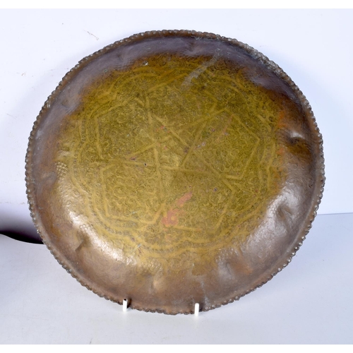 3470 - An Islamic heavily embossed tray together with an Australian wooden bowl. 36 cm (2),