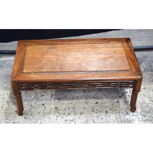 3483 - A small Chinese hardwood opium table 32 x 76 cm.