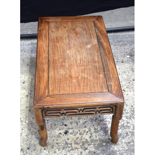 3483 - A small Chinese hardwood opium table 32 x 76 cm.