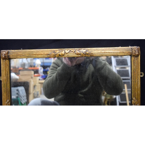 3489 - An antique gilt wood over mantle mirror 76 x 46 cm.