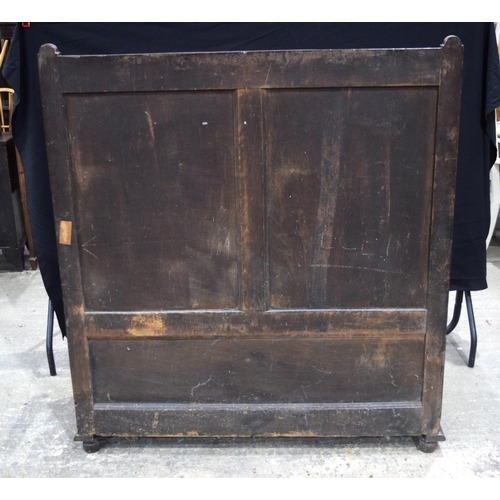 3490 - A large double panelled oak settle with blanket box 138 x 125 x 83 cm.