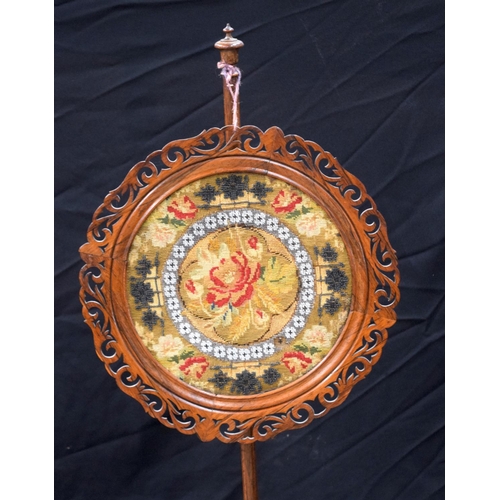 3492 - A Victorian carved wood pole screen  140 x 38 cm .