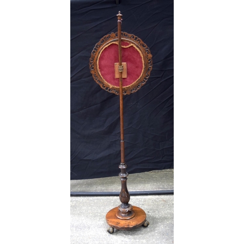 3492 - A Victorian carved wood pole screen  140 x 38 cm .