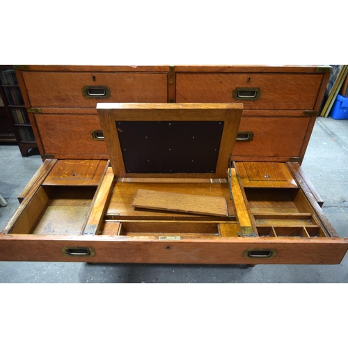 3503 - A Cavalier 6 drawer brass bound oak chest by Army and Navy with a rare secret velvet lined drawer. 1... 