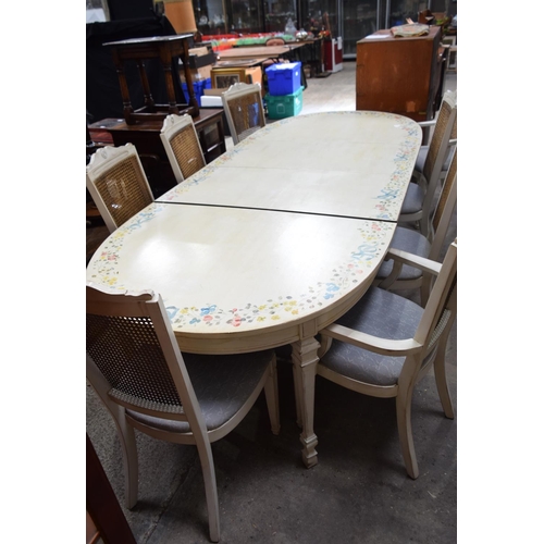 3504 - A hand painted extending dining table with 8 bergère style upholstered chairs previously in residenc... 