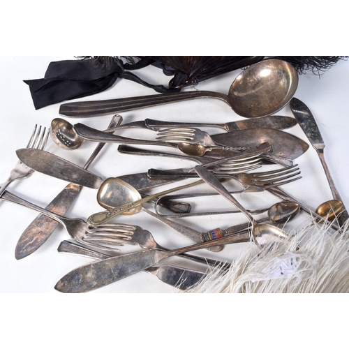 3824 - A collection of plated flatware, together with a tortoiseshell effect feather fan and a feather dust... 