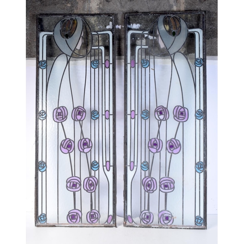 3828 - An Art Nouveau pair of stained glass leaded panels. 109 x 41cm (2).