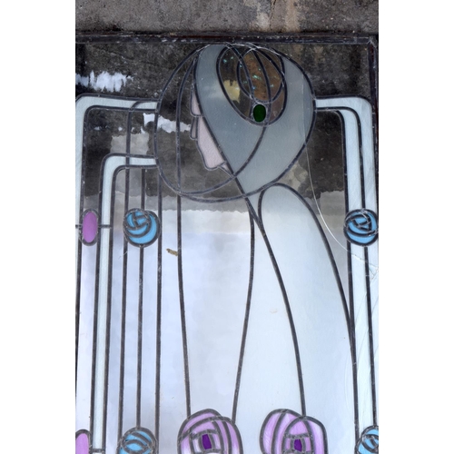 3828 - An Art Nouveau pair of stained glass leaded panels. 109 x 41cm (2).