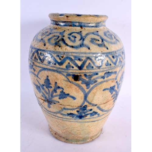 101 - A LARGE 19TH CENTURY PERSIAN BLUE AND WHITE POTTERY VASE together with a smaller flask. Largest 27 c... 