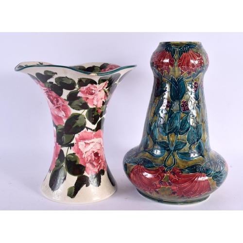 105 - AN ARTS AND CRAFTS MORRISWARE POTTERY VASE together with a flared Weymss rose vase. Largest 25 cm hi... 