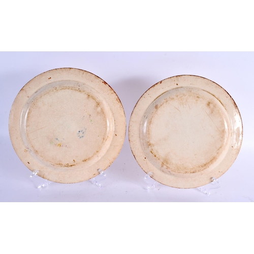 110 - A PAIR OF 19TH CENTURY CREAMWARE PAINTED PLATES together with a faience mug. Largest 21.5 cm diamete... 