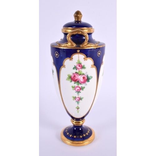 117 - A SMALL MINTONS PORCELAIN VASE AND COVER painted with flowers. 15 cm high.