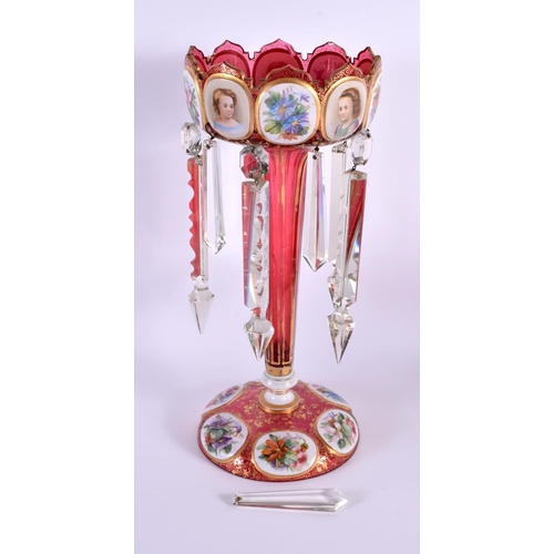 128 - A 19TH CENTURY BOHEMIAN RUBY GLASS TABLE LUSTRE. 34 cm x 12 cm.