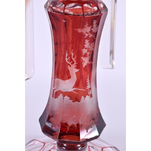 129 - A 19TH CENTURY BOHEMIAN RUBY AND CLEAR GLASS STAG TABLE LUSTRE. 27 cm x 14 cm.