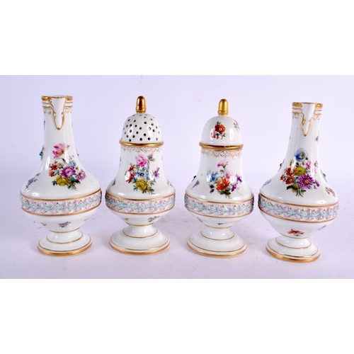 13 - A PAIR OF 19TH CENTURY GERMAN PORCELAIN JUGS painted with flowers in the manner of Meissen, together... 