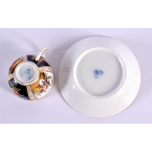 138 - A MINIATURE 19TH CENTURY GERMAN AUGUSTUS REX PORCELAIN CUP AND SAUCER. 7.5 cm diameter. (2)