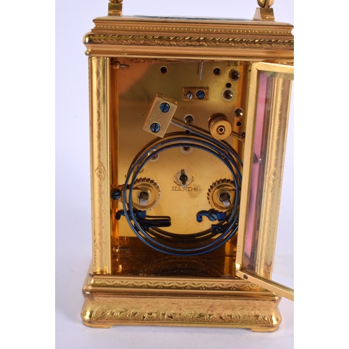 149 - A FINE 19TH CENTURY SEVRES PORCELAIN REPEATING CARRIAGE CLOCK painted with landscapes and figures. 1... 