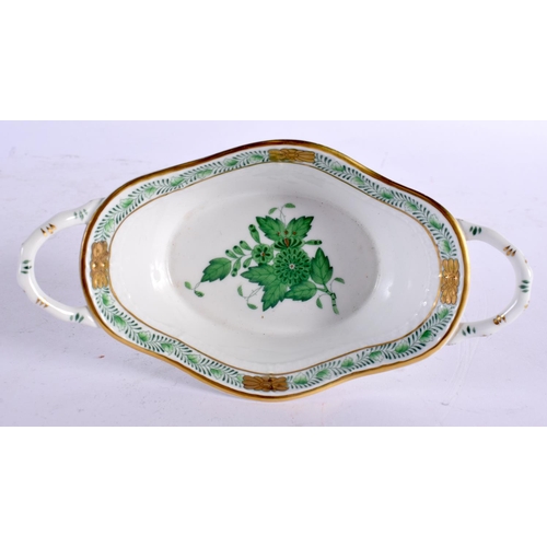 15 - A HUNGARIAN PORCELAIN BOX AND COVER together with a twin handled basket. Largest 15 cm wide. (2)