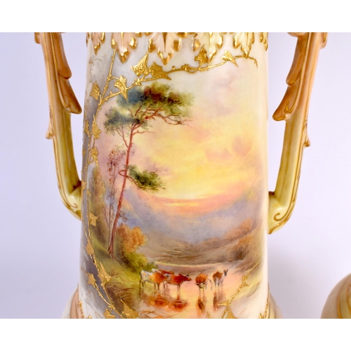 183 - A LARGE PAIR OF ROYAL WORCESTER BLUSH IVORY RETICULATED VASES painted with cattle in landscapes. 42 ... 