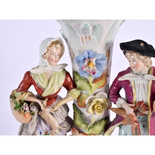 185 - A LARGE ANTIQUE GERMAN PORCELAIN CENTREPIECE formed with figures beside foliage. 44 cm x 20 cm.