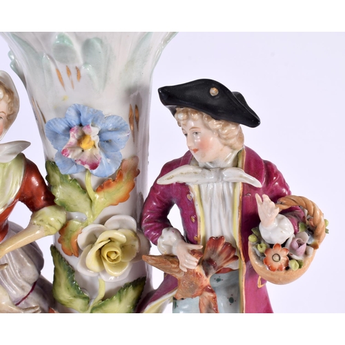 185 - A LARGE ANTIQUE GERMAN PORCELAIN CENTREPIECE formed with figures beside foliage. 44 cm x 20 cm.