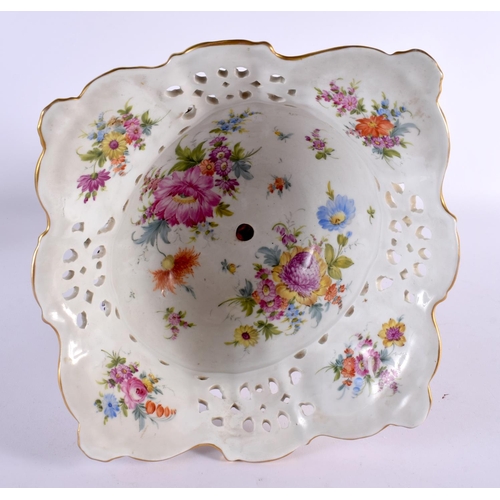 185 - A LARGE ANTIQUE GERMAN PORCELAIN CENTREPIECE formed with figures beside foliage. 44 cm x 20 cm.