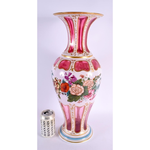 186 - A VERY LARGE 19TH CENTURY BOHEMIAN RUBY AND WHITE OVERLAID GLASS VASE painted with bold foliage. 52 ... 