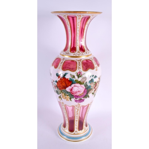 186 - A VERY LARGE 19TH CENTURY BOHEMIAN RUBY AND WHITE OVERLAID GLASS VASE painted with bold foliage. 52 ... 