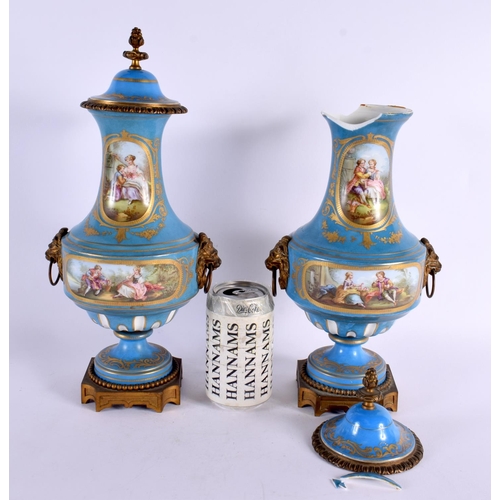 187 - A PAIR OF 19TH CENTURY FRENCH SEVRES PORCELAIN VASES AND COVERS with bronze mounts, painted with fig... 