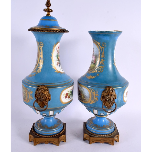 187 - A PAIR OF 19TH CENTURY FRENCH SEVRES PORCELAIN VASES AND COVERS with bronze mounts, painted with fig... 