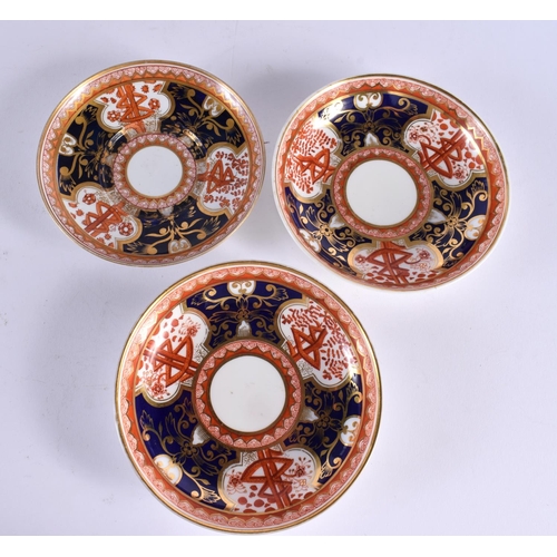 206 - Early 19th century Spode two handled pedestal cup with welled saucer and two Spode cups and saucers ... 