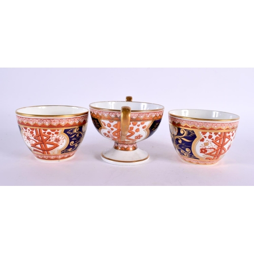 206 - Early 19th century Spode two handled pedestal cup with welled saucer and two Spode cups and saucers ... 