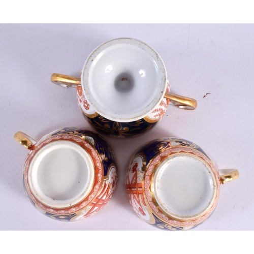 206 - Early 19th century Spode two handled pedestal cup with welled saucer and two Spode cups and saucers ... 