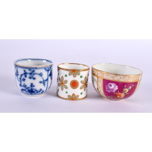 227 - Late 19th century two German miniature cups and saucers one with a Watteauesque panels and a small j... 