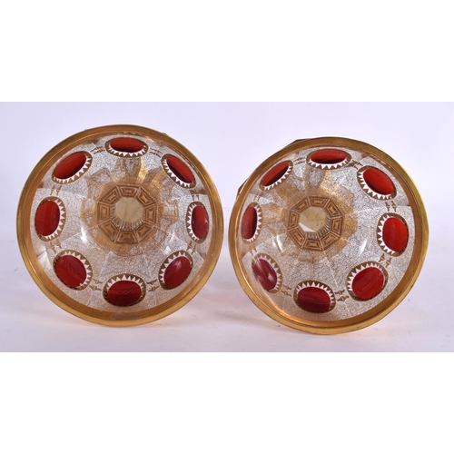 23 - A PAIR OF 19TH CENTURY BOHEMIAN GILT AND CRANBERRY GLASS GOBLETS bearing label to base Alexander I 1... 