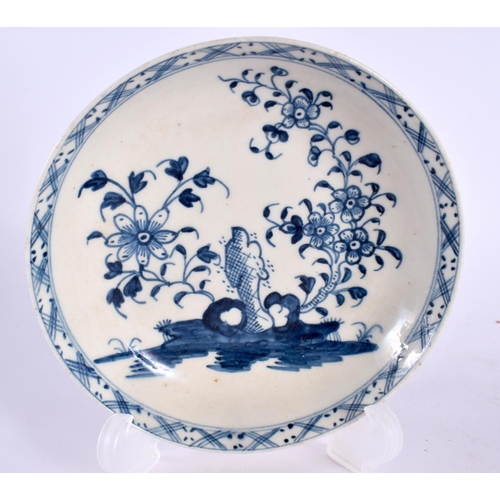 233 - 18th century Lowestoft teabowl and saucer painted in blue with a holed rock and flowering tree. Teab... 