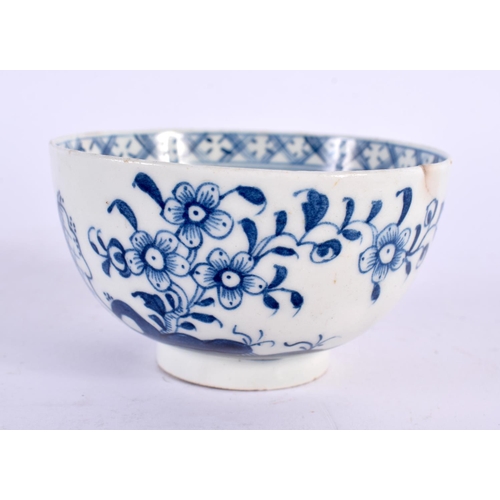 233 - 18th century Lowestoft teabowl and saucer painted in blue with a holed rock and flowering tree. Teab... 