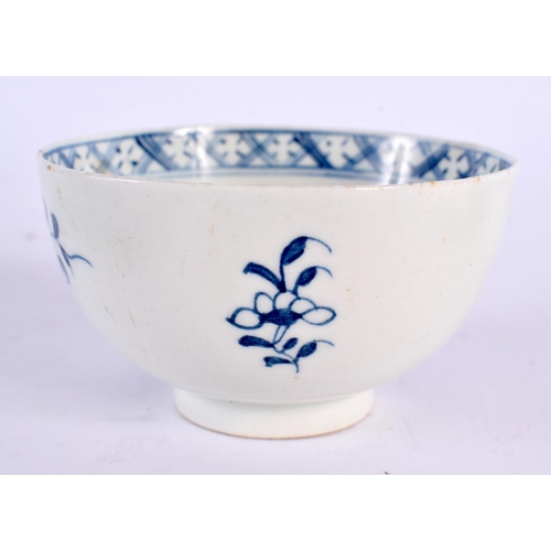 233 - 18th century Lowestoft teabowl and saucer painted in blue with a holed rock and flowering tree. Teab... 